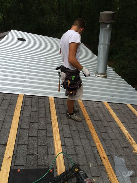 putting metal over existing shingles on my house|install metal roofing over asphalt shingles.